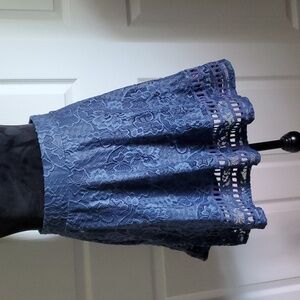 Blue lacy skirt.